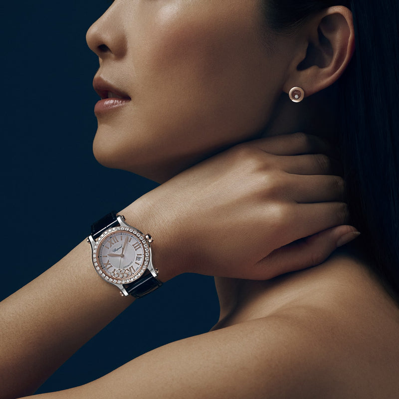 Model wearing Happy Sport 36mm Automatic 18k rose gold and steel watch